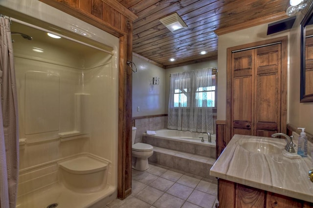 bathroom featuring toilet, vanity, wood ceiling, tile floors, and tiled tub