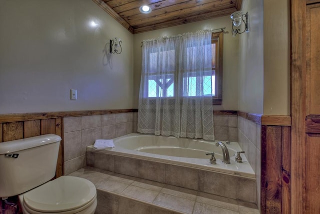 bathroom with tiled tub, toilet, wood ceiling, and tile flooring