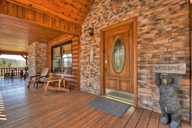 property entrance featuring covered porch