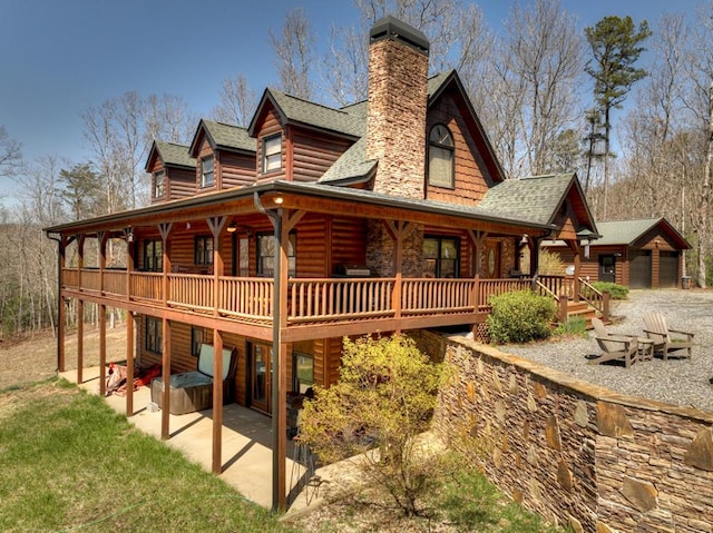 cabin featuring a patio