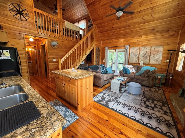 275 Walkers Rdg, Murphy, NC 28906 - living area featuring wooden walls, stairway, hardwood / wood-style floors, ceiling fan, and wooden ceiling