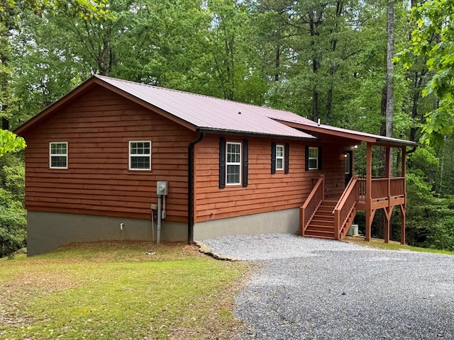 view of home's exterior featuring metal roof