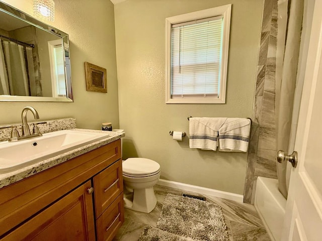 bathroom featuring curtained shower, vanity, toilet, baseboards, and a tub to relax in