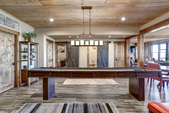 playroom featuring wooden ceiling, pool table, a barn door, and wood finished floors