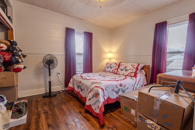 bedroom featuring dark wood-type flooring