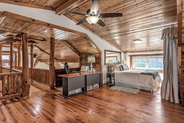 bedroom with ceiling fan, vaulted ceiling with beams, hardwood / wood-style flooring, and wooden ceiling