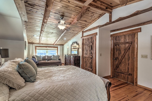 bedroom with wood ceiling, vaulted ceiling with beams, ceiling fan, and hardwood / wood-style floors