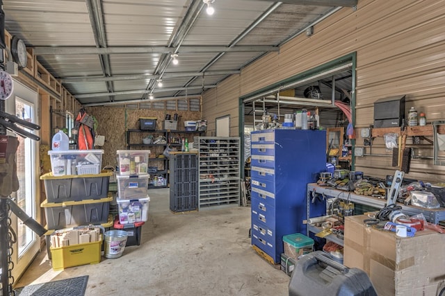 garage with wood walls