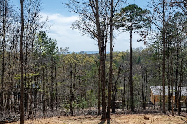 view of local wilderness with a view of trees