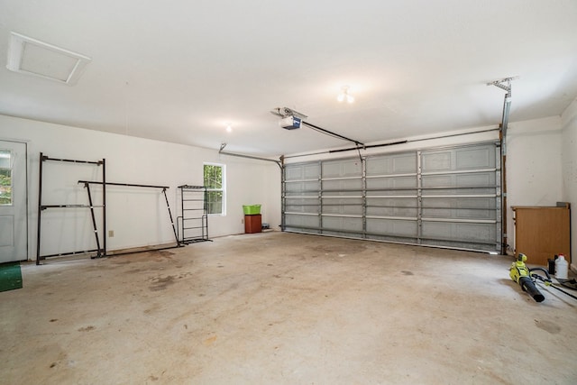 garage featuring a garage door opener