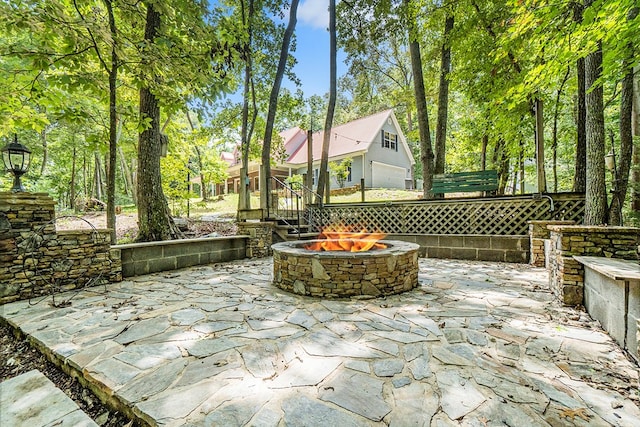 view of patio featuring a fire pit