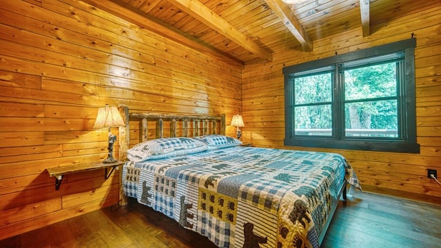 bedroom with wooden ceiling, dark wood-type flooring, beam ceiling, and wood walls