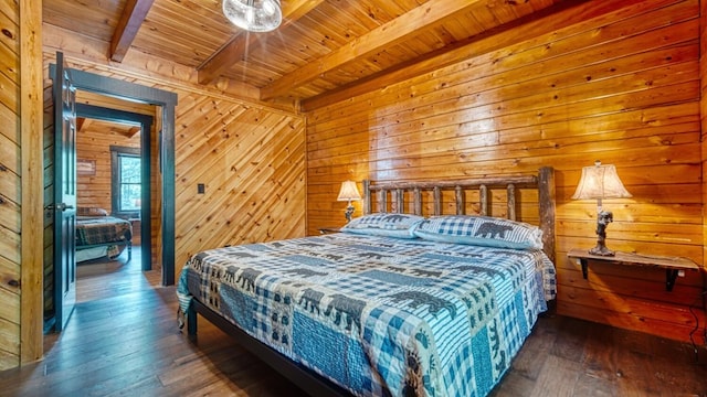 bedroom with wooden ceiling, dark wood-type flooring, beam ceiling, and wood walls