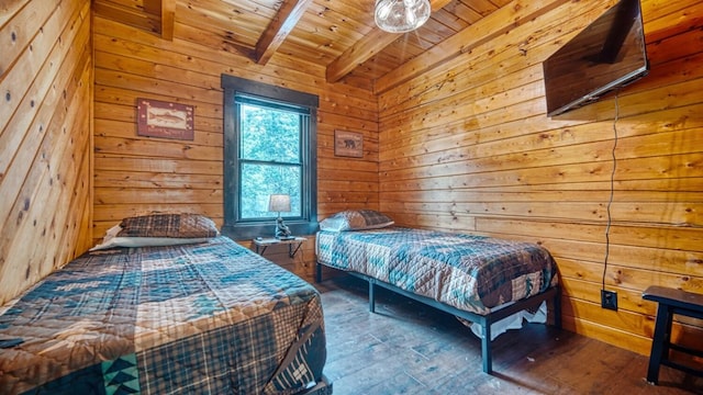 bedroom with wood-type flooring, lofted ceiling with beams, wooden walls, and wood ceiling