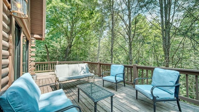 wooden deck with outdoor lounge area