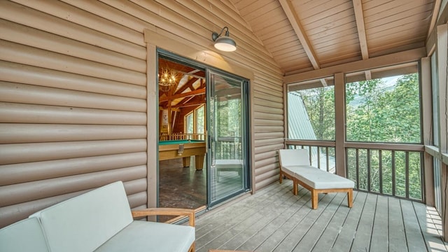 sunroom with wooden ceiling, vaulted ceiling with beams, and billiards