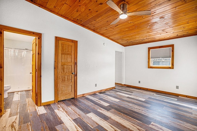 empty room with vaulted ceiling, wooden ceiling, wood-type flooring, and ceiling fan