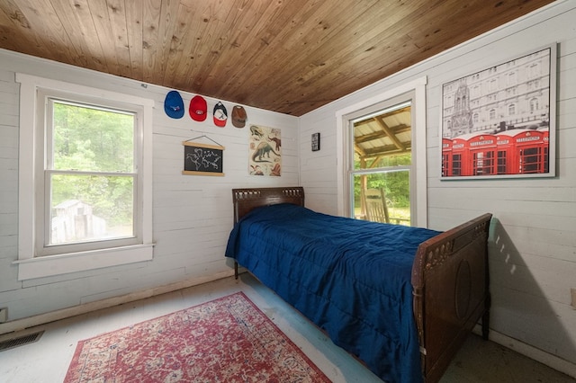bedroom with wood ceiling