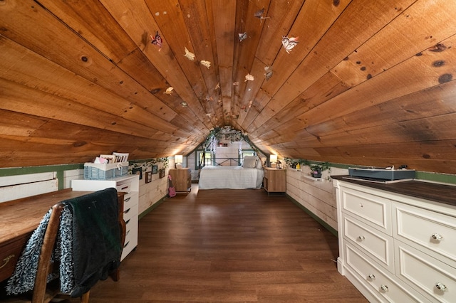 unfurnished bedroom featuring dark wood-style flooring, lofted ceiling, and wooden ceiling