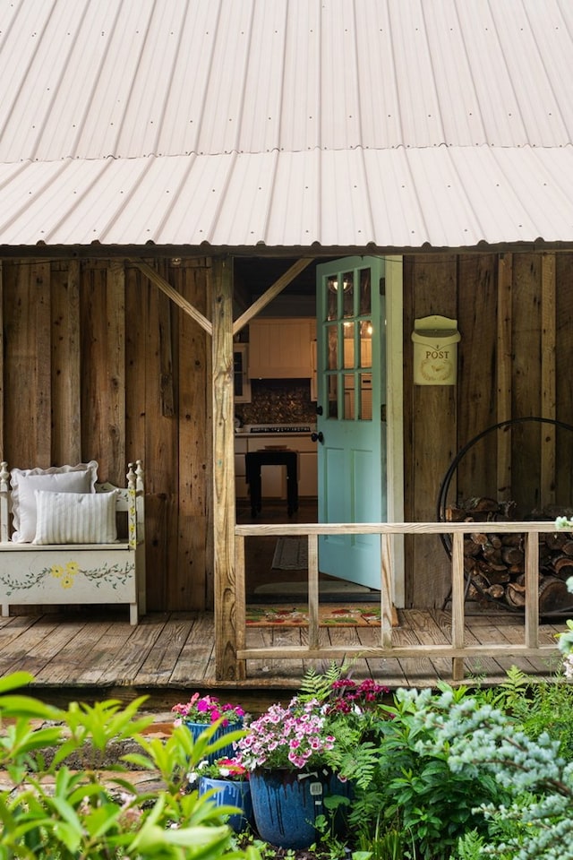 doorway to property with a deck