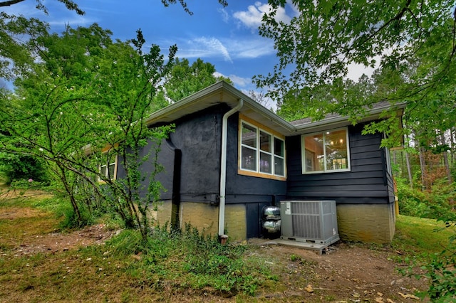 exterior space with central air condition unit