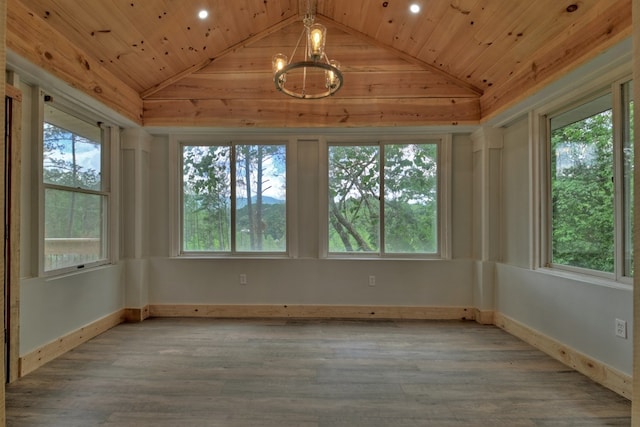 unfurnished sunroom with a chandelier and a wealth of natural light