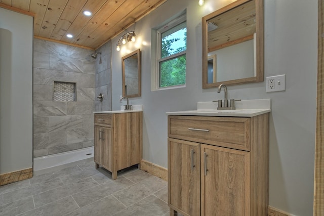 bathroom with recessed lighting, two vanities, wood ceiling, and a tile shower