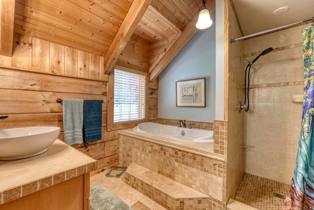 bathroom featuring vanity, vaulted ceiling with beams, wood ceiling, and shower with separate bathtub