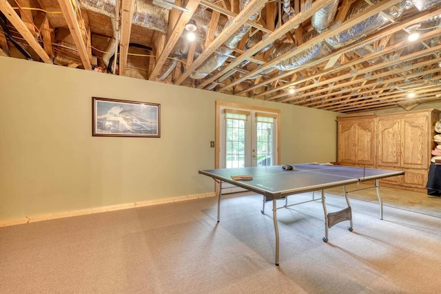 playroom featuring french doors and carpet flooring