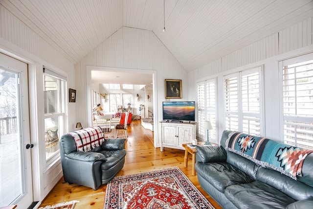 sunroom / solarium with lofted ceiling