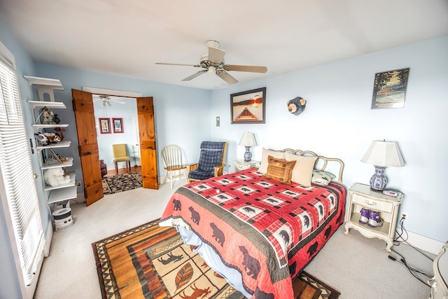 bedroom with ceiling fan and carpet