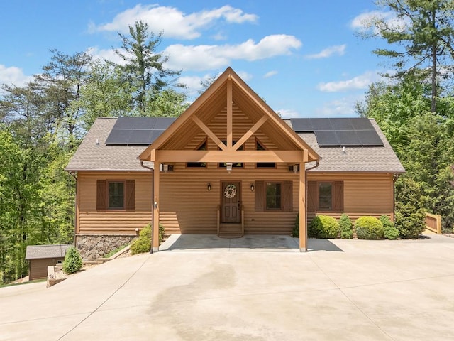 1172 Settlers Ridge Rd, Ellijay, GA 30540 - rustic home featuring solar panels and a shingled roof