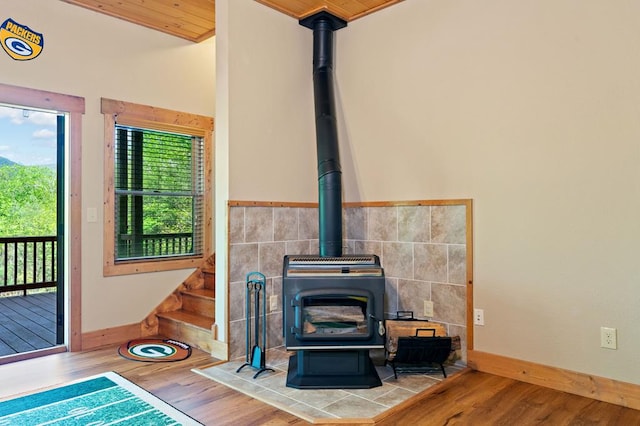 1172 Settlers Ridge Rd, Ellijay, GA 30540 - detailed view of a wood stove, wood finished floors, baseboards, and tile walls