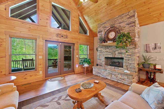 1172 Settlers Ridge Rd, Ellijay, GA 30540 - living room with healthy amount of natural light, french doors, wood finished floors, wooden ceiling, and wood walls