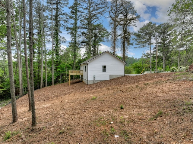 view of yard featuring a wooden deck