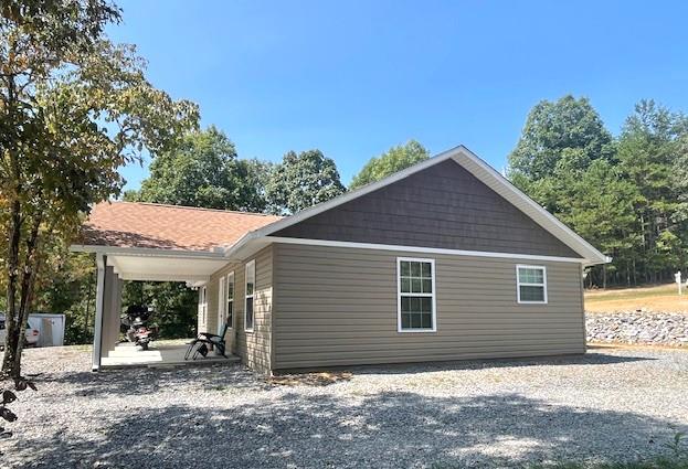 rear view of property with a patio area