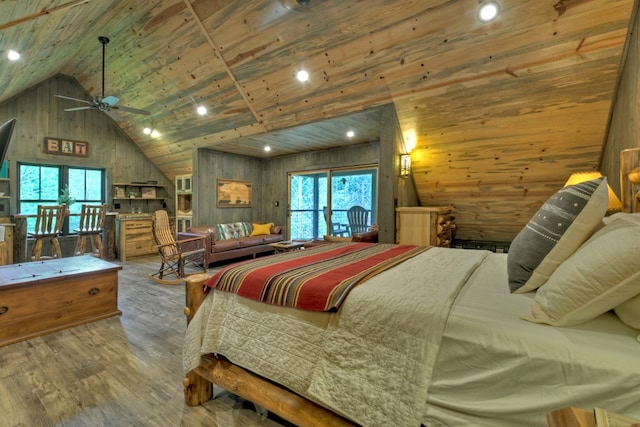 bedroom with wooden ceiling, wooden walls, multiple windows, and light wood-type flooring