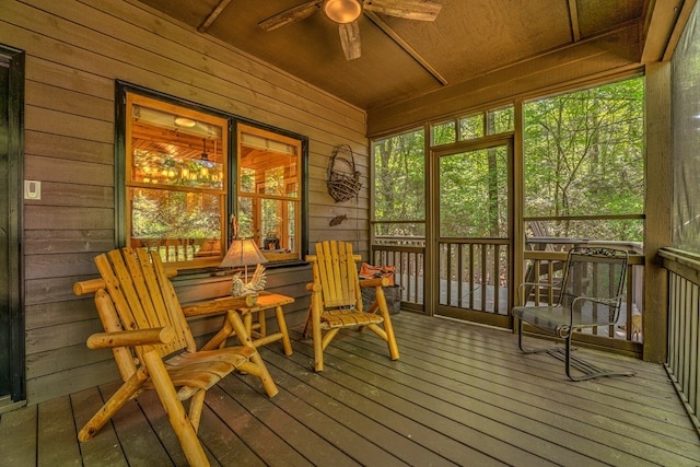 sunroom / solarium with ceiling fan