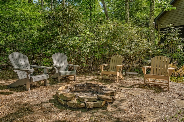 view of patio featuring an outdoor fire pit