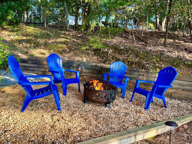 view of playground with a fire pit