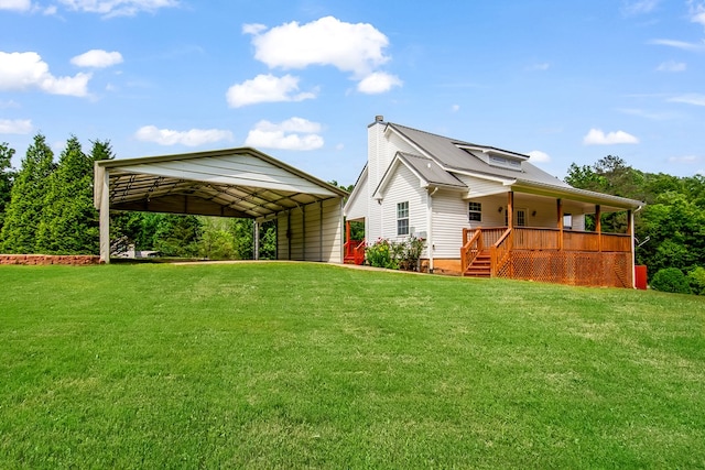 421 Burgess Rd, Ellijay, GA 30540 - back of property featuring a carport, a lawn, a chimney, and covered porch