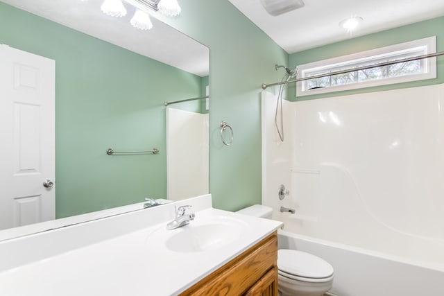 421 Burgess Rd, Ellijay, GA 30540 - bathroom featuring toilet, vanity, and washtub / shower combination