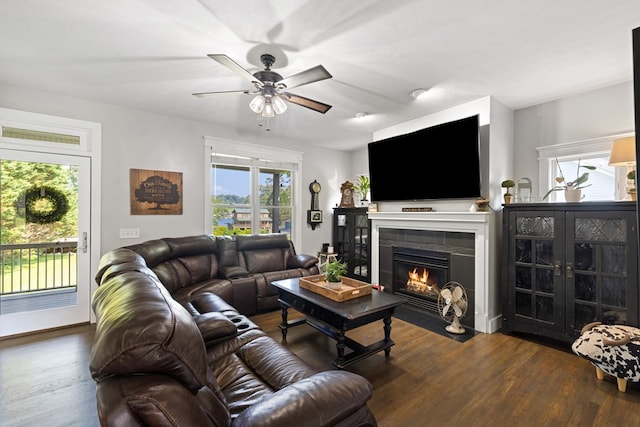 429 Sneaking Creek Dr, Hayesville, NC 28904 - living area with wood finished floors, healthy amount of natural light, a fireplace, and a ceiling fan