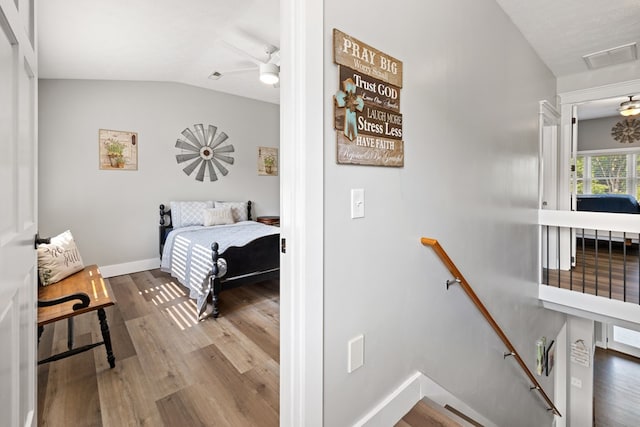 429 Sneaking Creek Dr, Hayesville, NC 28904 - bedroom featuring vaulted ceiling, wood finished floors, and baseboards