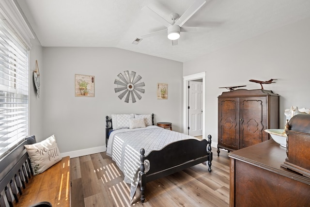 429 Sneaking Creek Dr, Hayesville, NC 28904 - bedroom with light wood-type flooring, lofted ceiling, baseboards, and ceiling fan