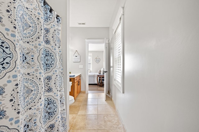 429 Sneaking Creek Dr, Hayesville, NC 28904 - full bathroom featuring vanity, tile patterned floors, baseboards, and a shower with curtain