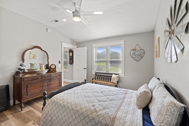 429 Sneaking Creek Dr, Hayesville, NC 28904 - bedroom featuring light wood-type flooring, lofted ceiling, ceiling fan, and baseboards