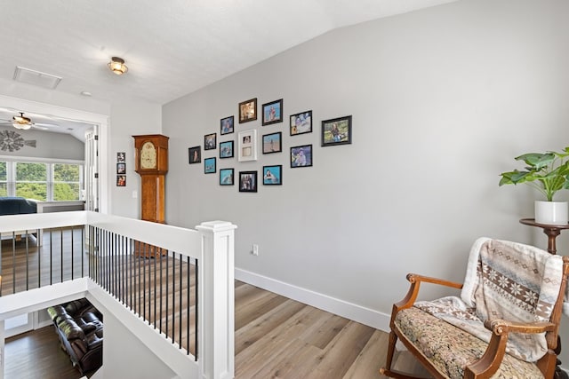 429 Sneaking Creek Dr, Hayesville, NC 28904 - hallway with an upstairs landing, wood finished floors, lofted ceiling, and baseboards