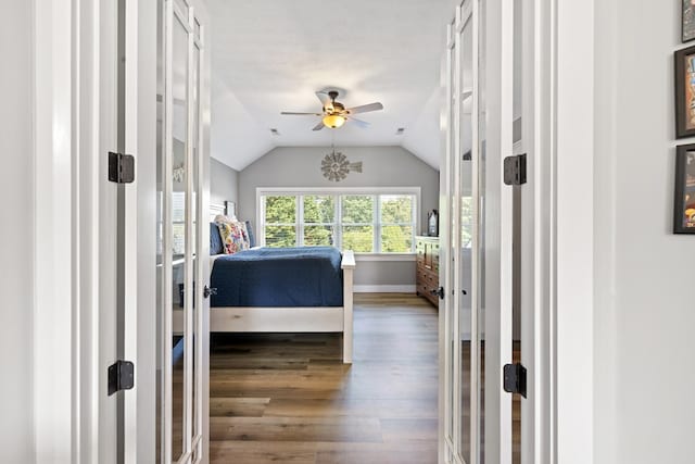429 Sneaking Creek Dr, Hayesville, NC 28904 - bedroom featuring wood finished floors, french doors, vaulted ceiling, baseboards, and ceiling fan