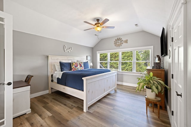 429 Sneaking Creek Dr, Hayesville, NC 28904 - bedroom with baseboards, lofted ceiling, wood finished floors, and a ceiling fan